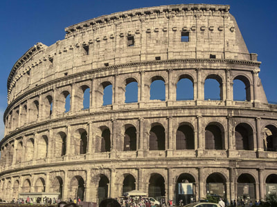 The Colosseum is an impressive place. It is a horrific place. It is a place of great public will. It is a place of popular entertainment. It is a piece of history. Its outside has the repetitive patterns that appeal. Its insides are destruction.